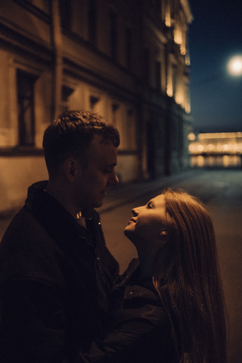 Couple on a dim city street